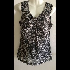 Top by 212 Collection sleeveless grayish black size small. Crisscrossed …